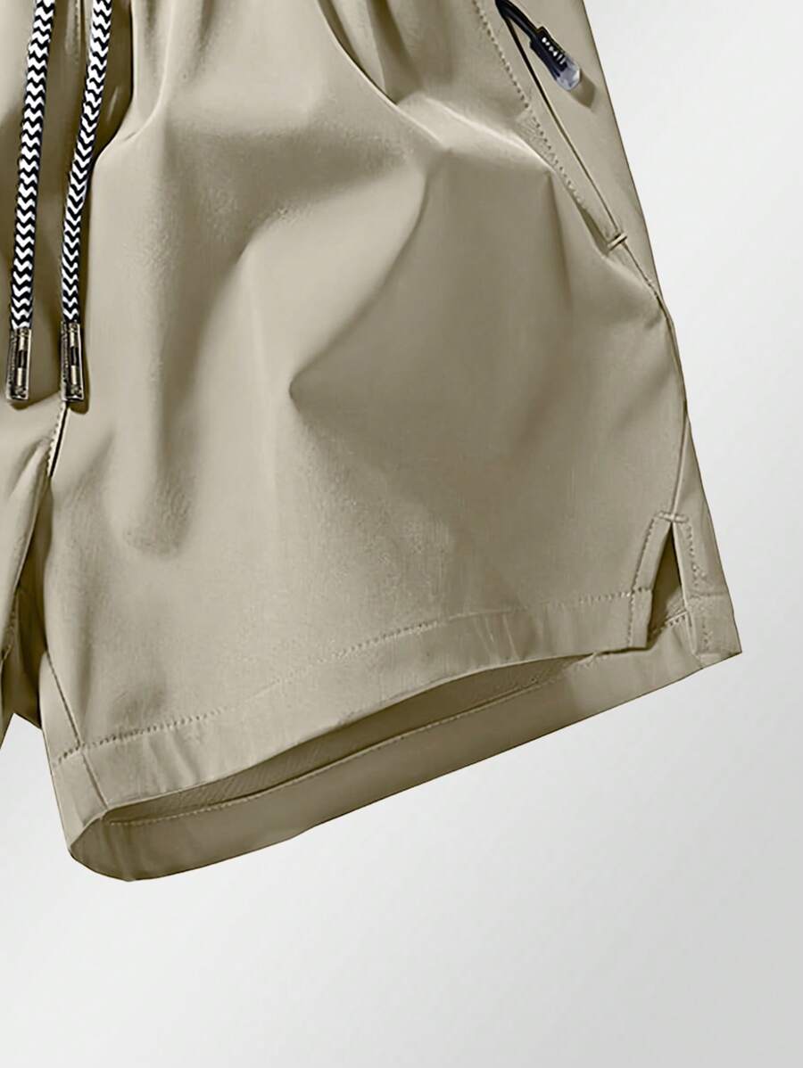 Shorts de sport taille élastique avec poches zippées et cordon