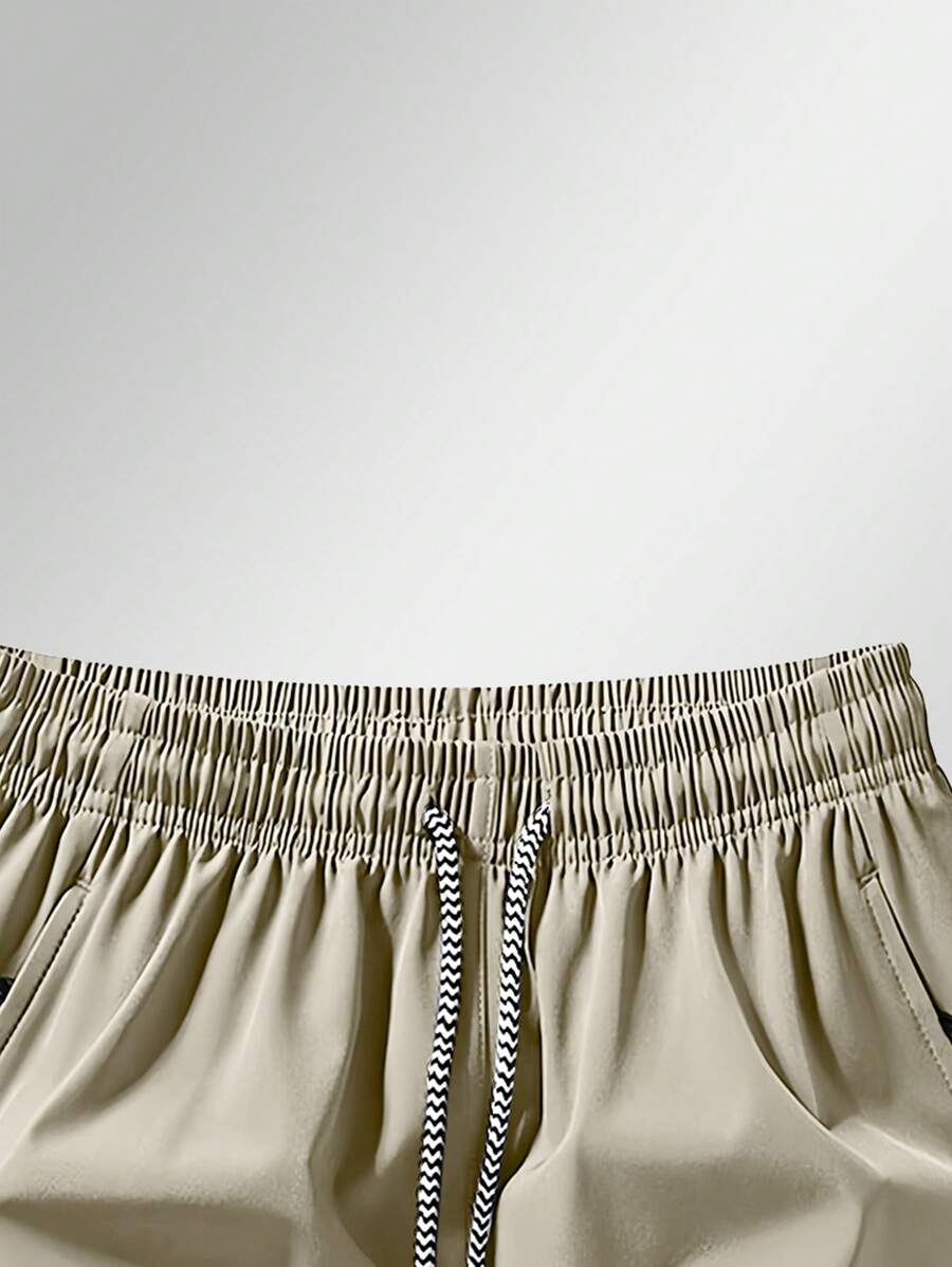 Shorts de sport taille élastique avec poches zippées et cordon