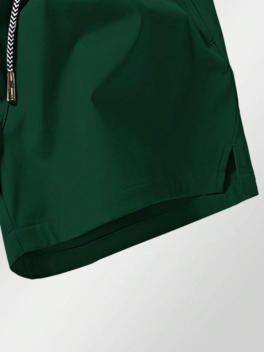 Shorts de sport taille élastique avec poches zippées et cordon