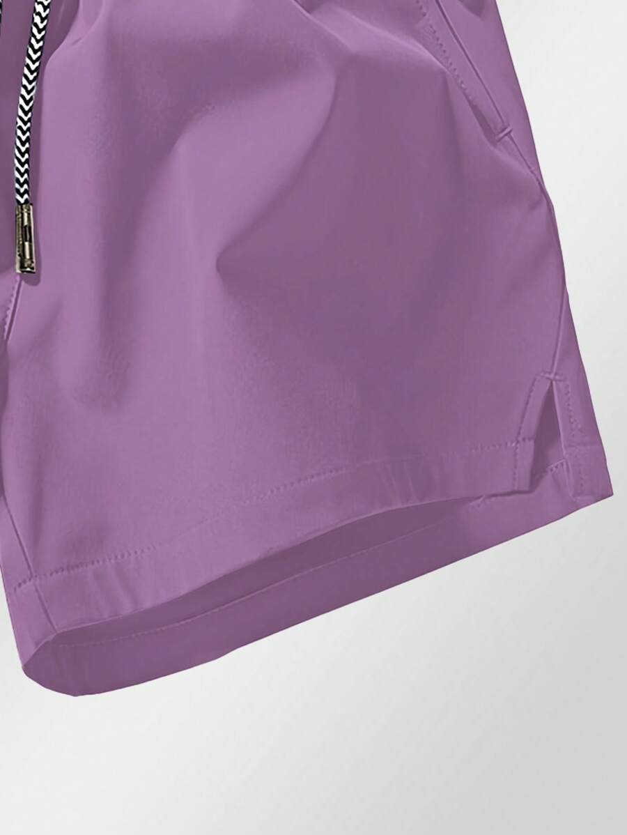 Shorts de sport taille élastique avec poches zippées et cordon