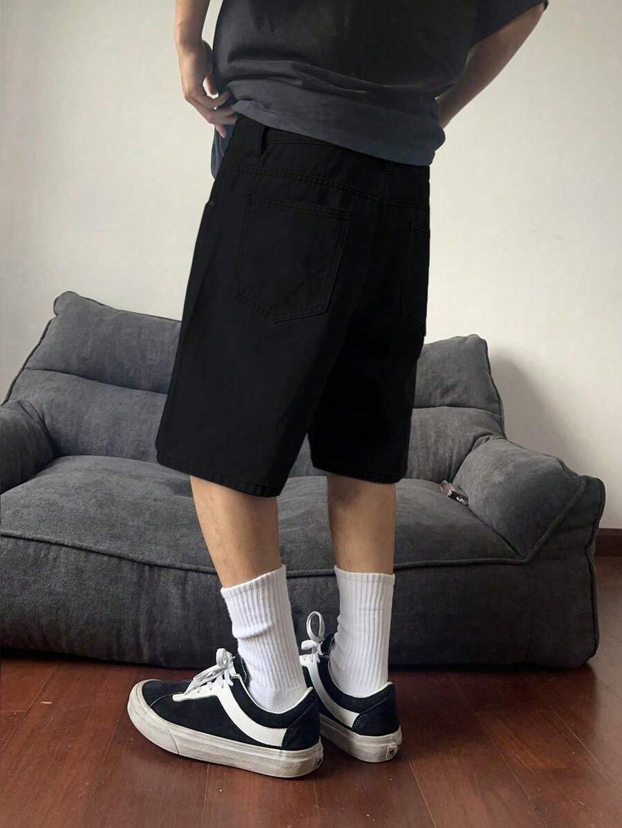 Bermuda large avec détails de boutons et de poches pour homme