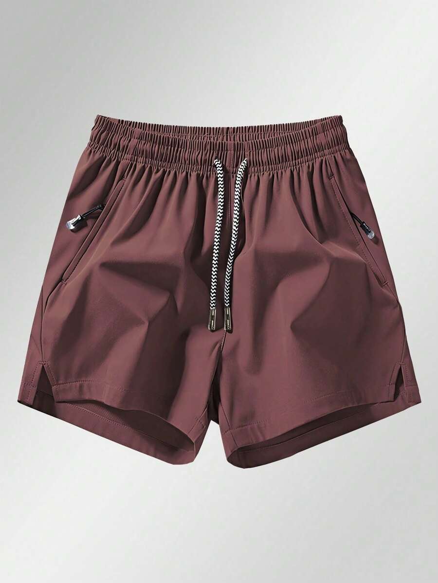 Shorts de sport taille élastique avec poches zippées et cordon