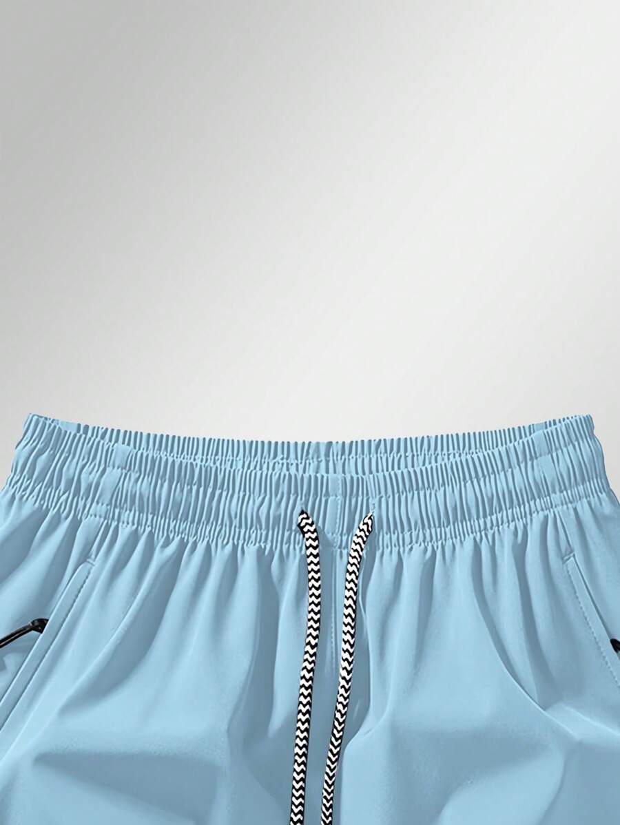 Shorts de sport taille élastique avec poches zippées et cordon