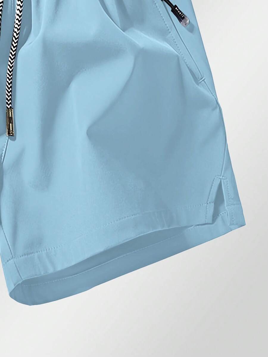 Shorts de sport taille élastique avec poches zippées et cordon