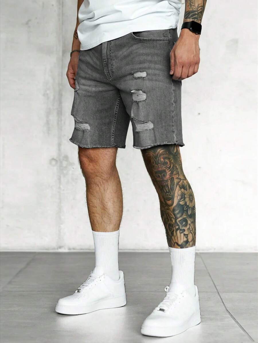Jorts déchirés à ourlet brut, style streetwear décontracté tendance pour hommes
