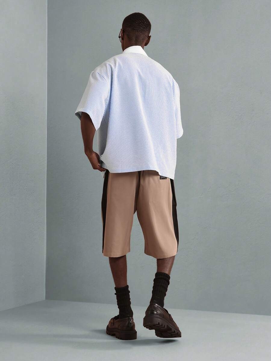 Chemises surdimensionnées polo rayée décontractée et oversize, zip à mi-hauteur