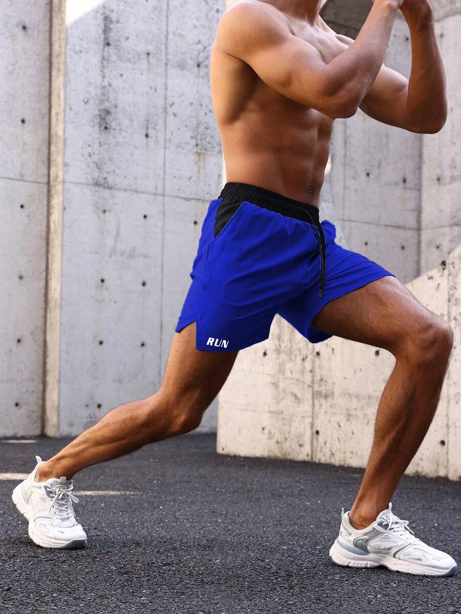 Shorts de sport avec taille élastique, poches larges et inscription