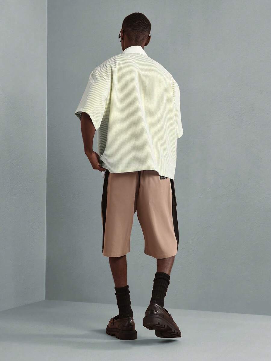Chemises surdimensionnées polo rayée décontractée et oversize, zip à mi-hauteur