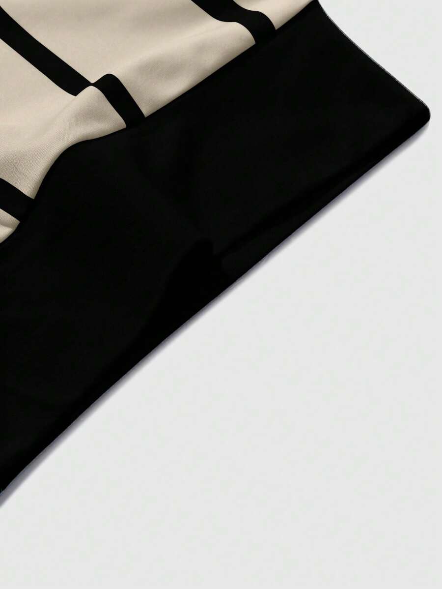 Chemise décontractée à manches courtes et rayures, col rond et coupe ample