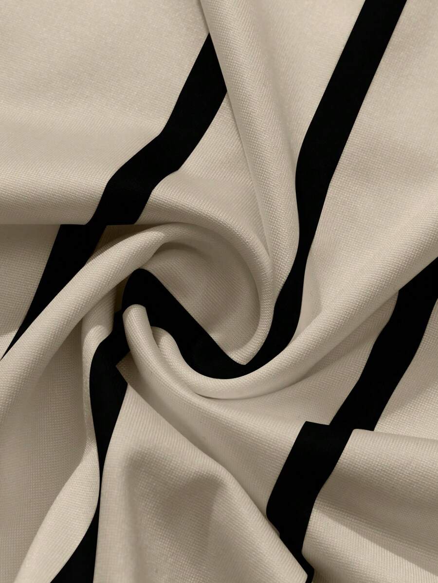 Chemise décontractée à manches courtes et rayures, col rond et coupe ample