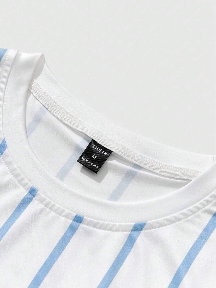 Chemise décontractée à manches courtes et rayures, col rond et coupe ample
