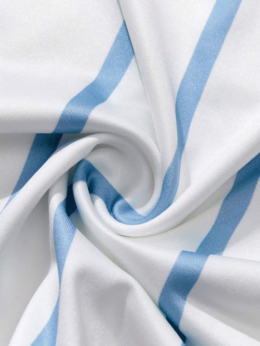 Chemise décontractée à manches courtes et rayures, col rond et coupe ample