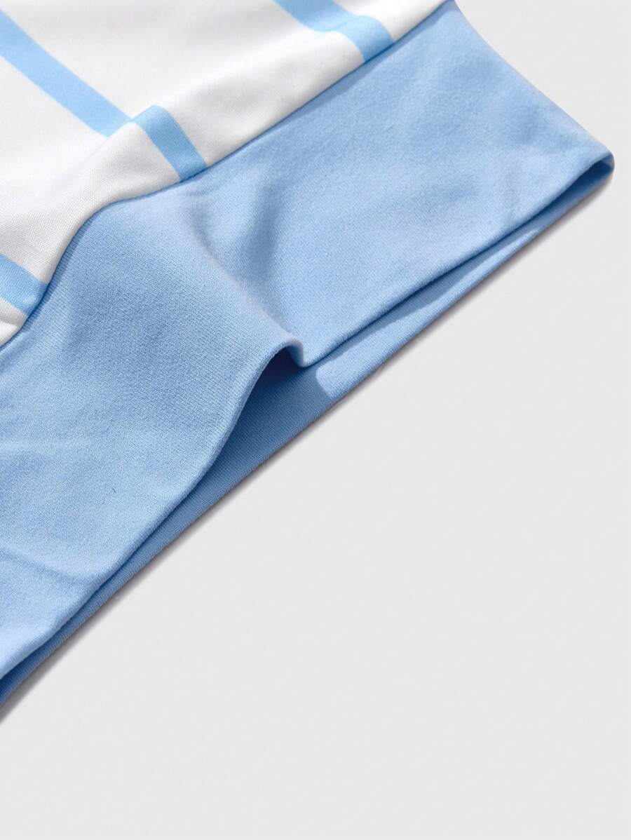 Chemise décontractée à manches courtes et rayures, col rond et coupe ample