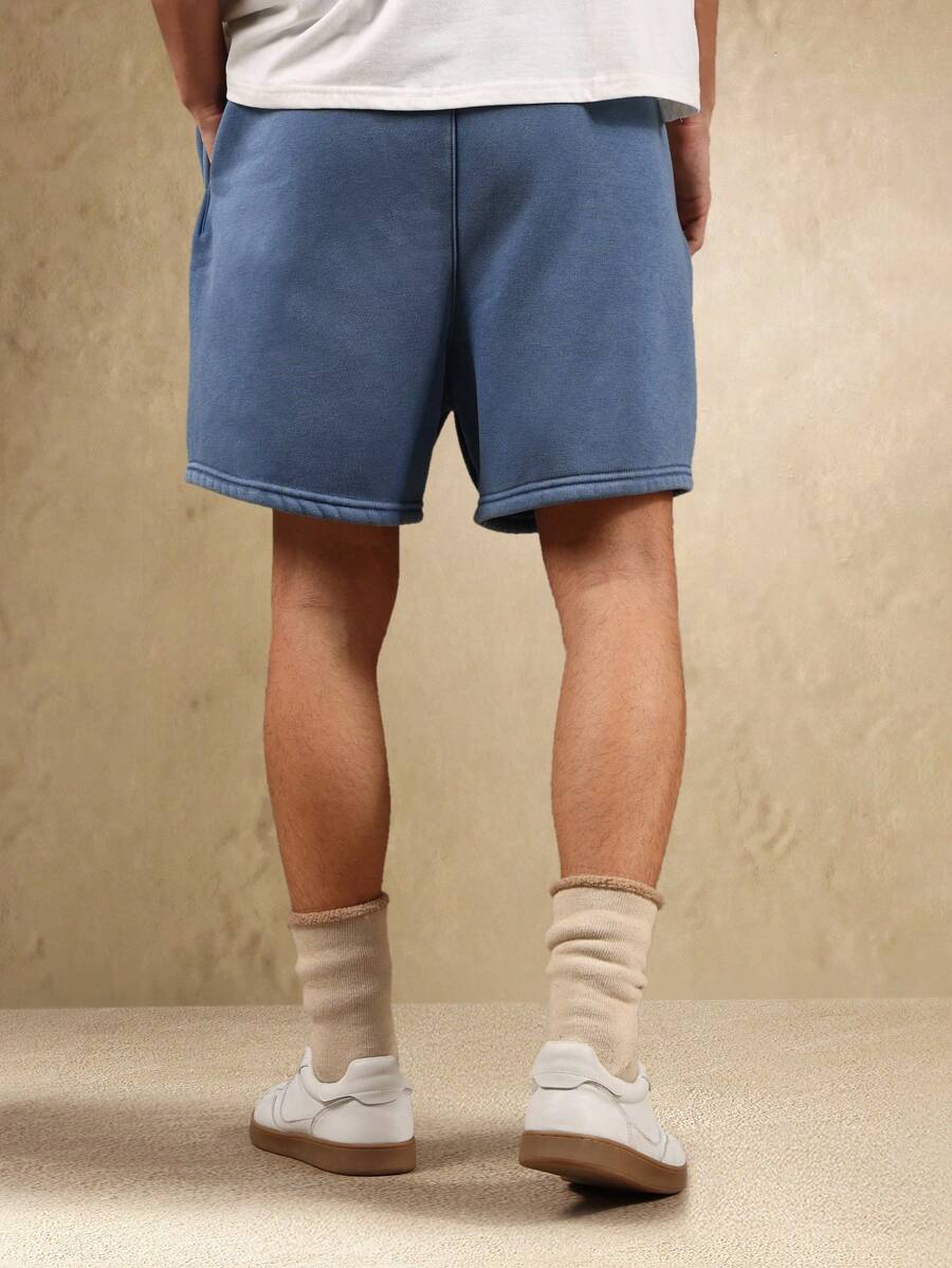Bermuda athlétique taille haute à entrejambe bas – Style détente pour homme