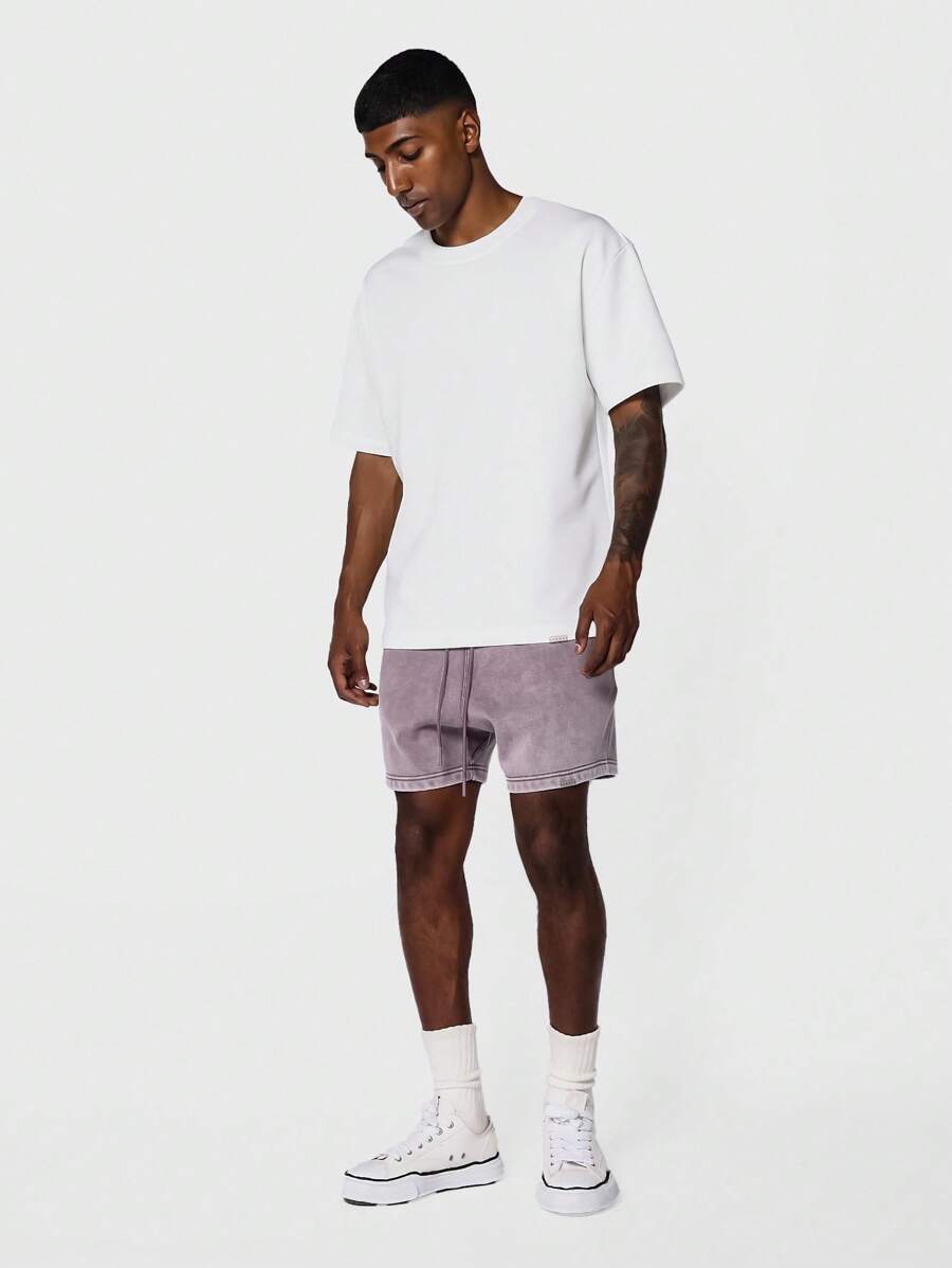 Bermuda athlétique taille haute à entrejambe bas – Style détente pour homme