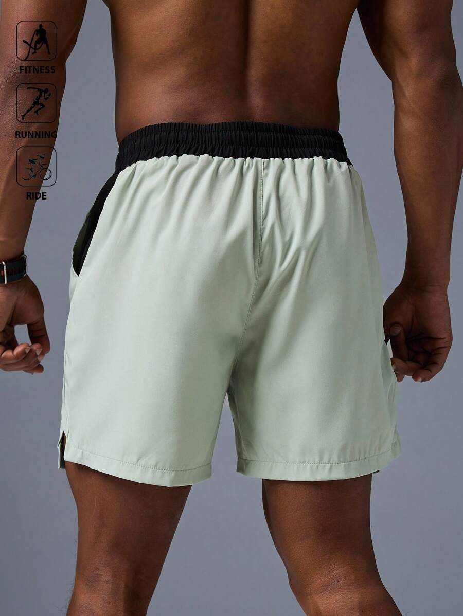 Shorts de sport avec taille élastique, poches larges et inscription