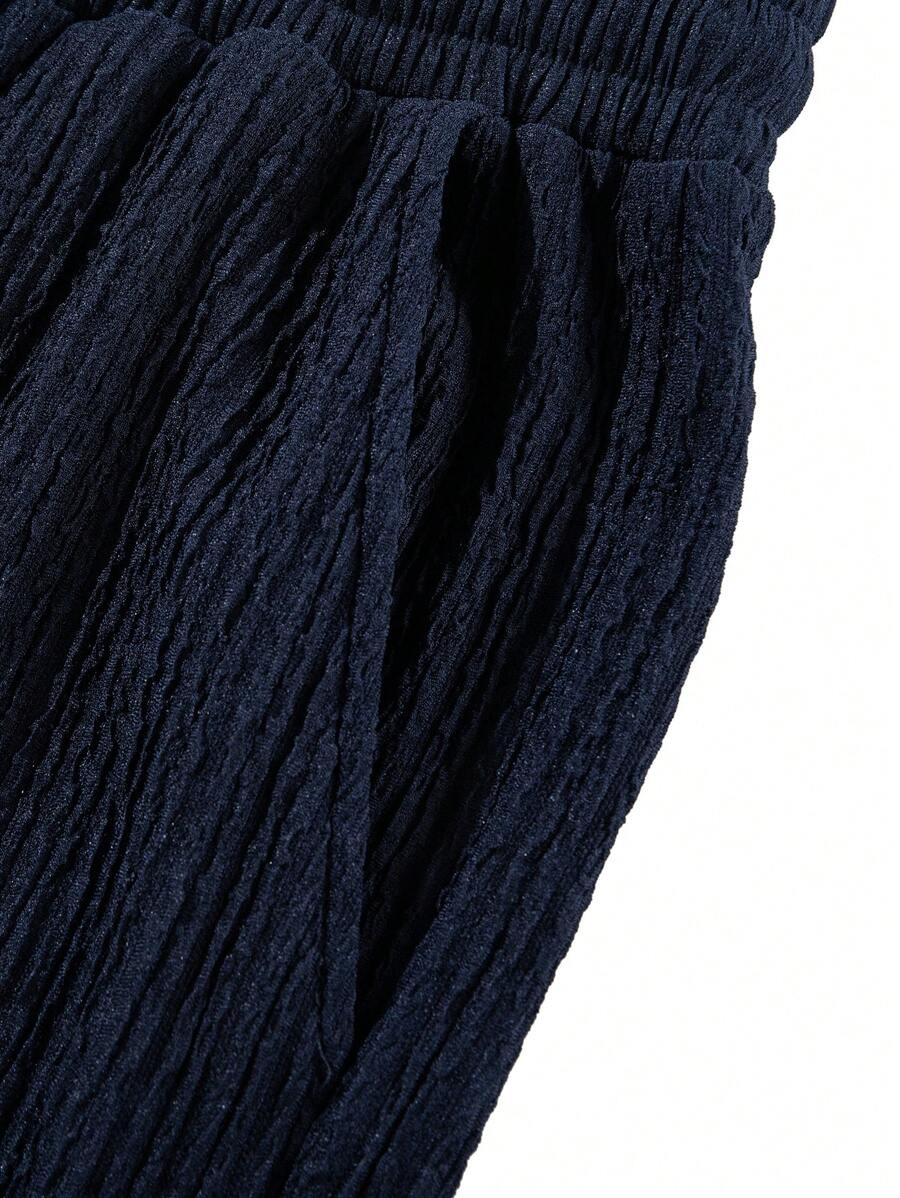 Pantalon droit décontracté en tissu froissé de couleur unie pour homme