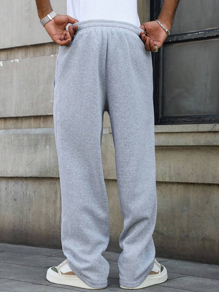 Pantalon droit athlétique ultra-ample à la mode avec cordon de serrage pour homme
