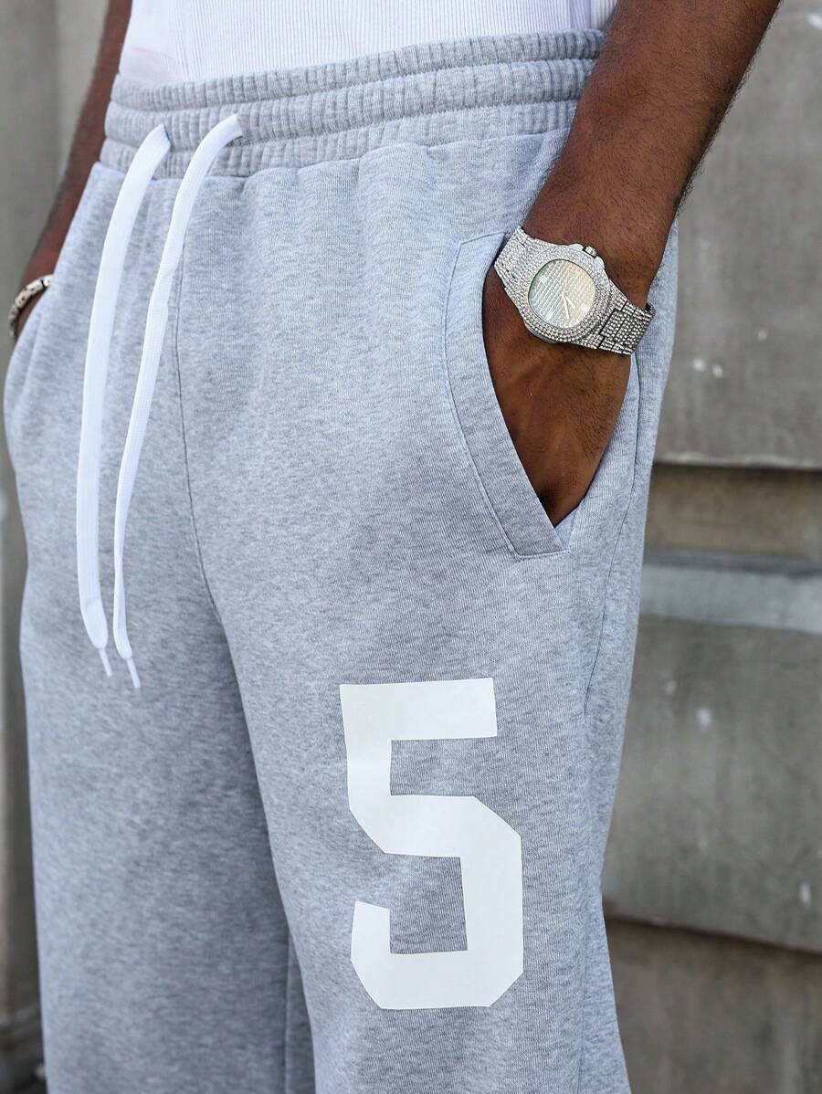 Pantalon droit athlétique ultra-ample à la mode avec cordon de serrage pour homme