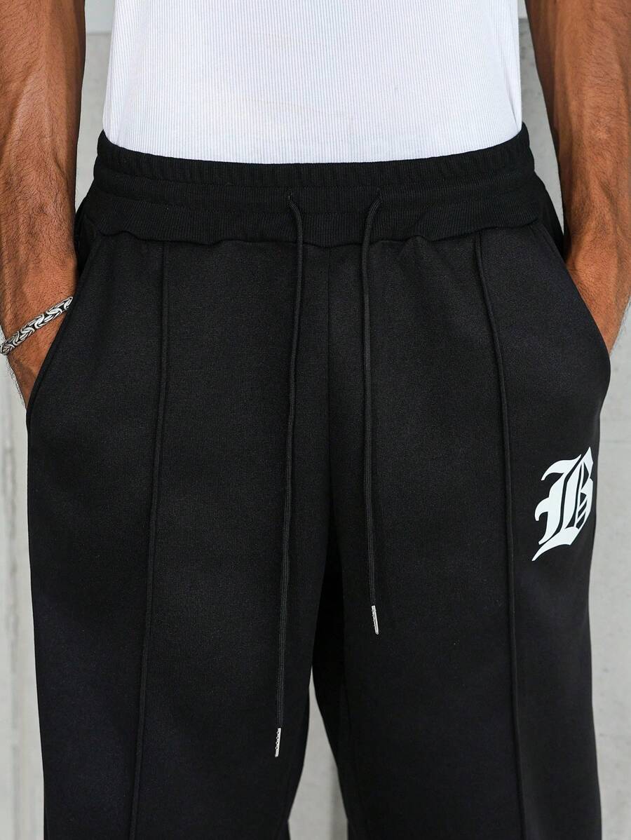 Pantalon droit athlétique ultra-ample à la mode avec cordon de serrage pour homme