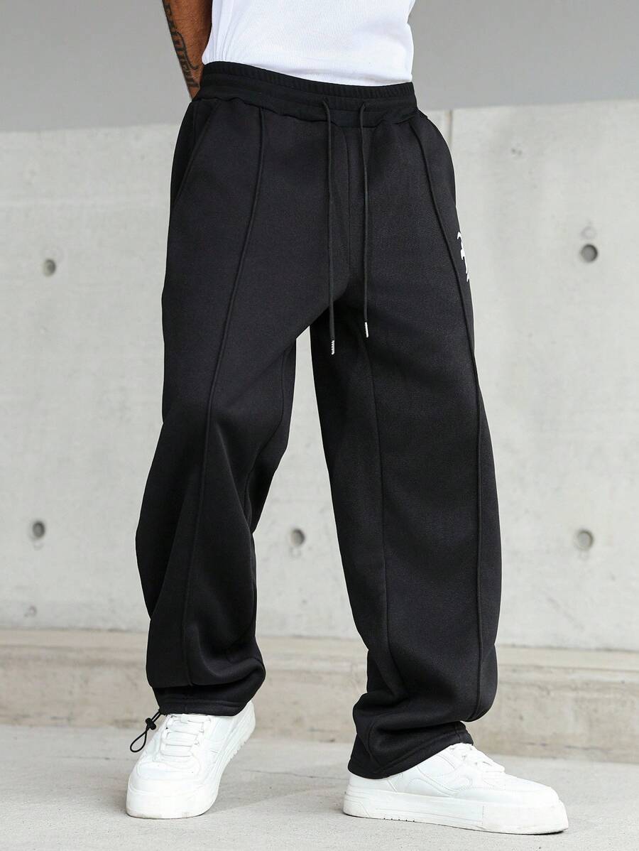 Pantalon droit athlétique ultra-ample à la mode avec cordon de serrage pour homme