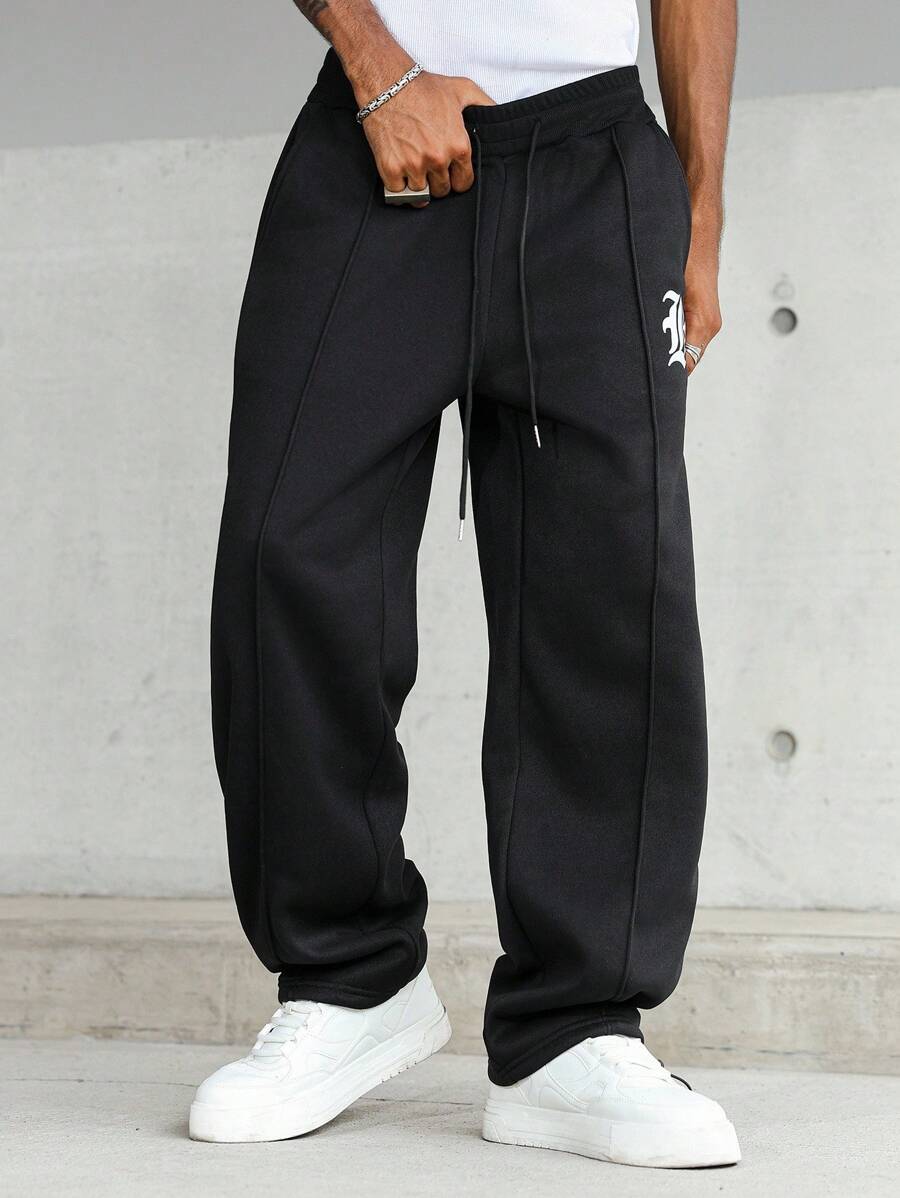 Pantalon droit athlétique ultra-ample à la mode avec cordon de serrage pour homme
