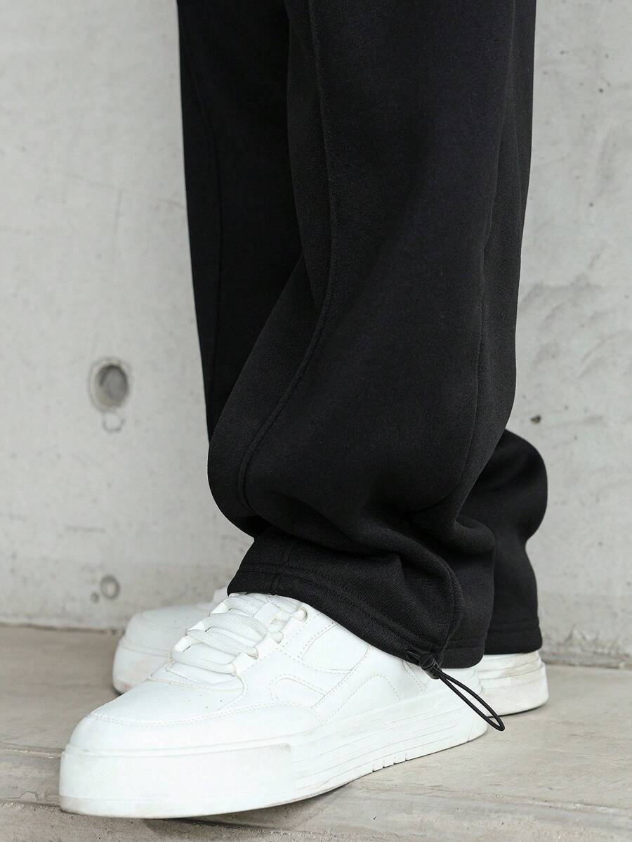 Pantalon droit athlétique ultra-ample à la mode avec cordon de serrage pour homme