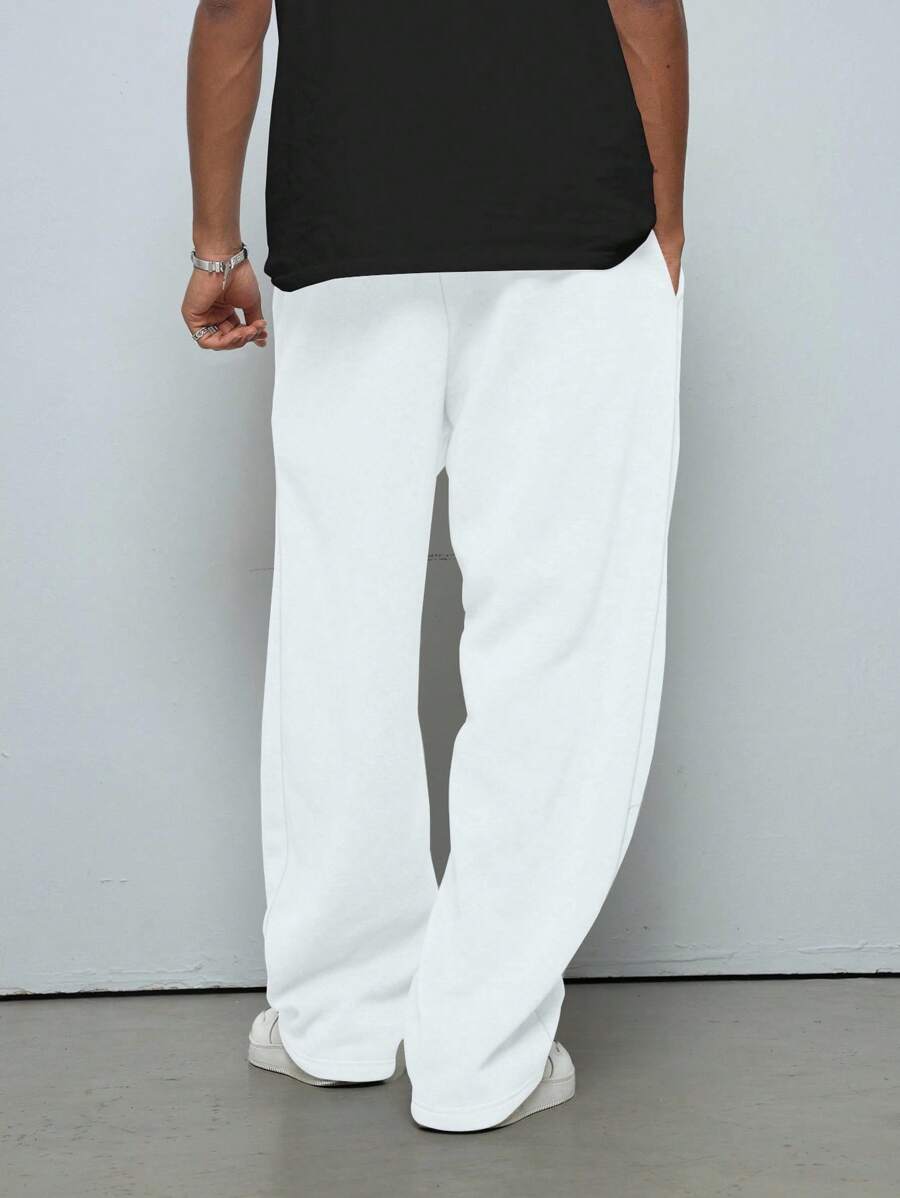 Pantalon droit athlétique ultra-ample à la mode avec cordon de serrage pour homme