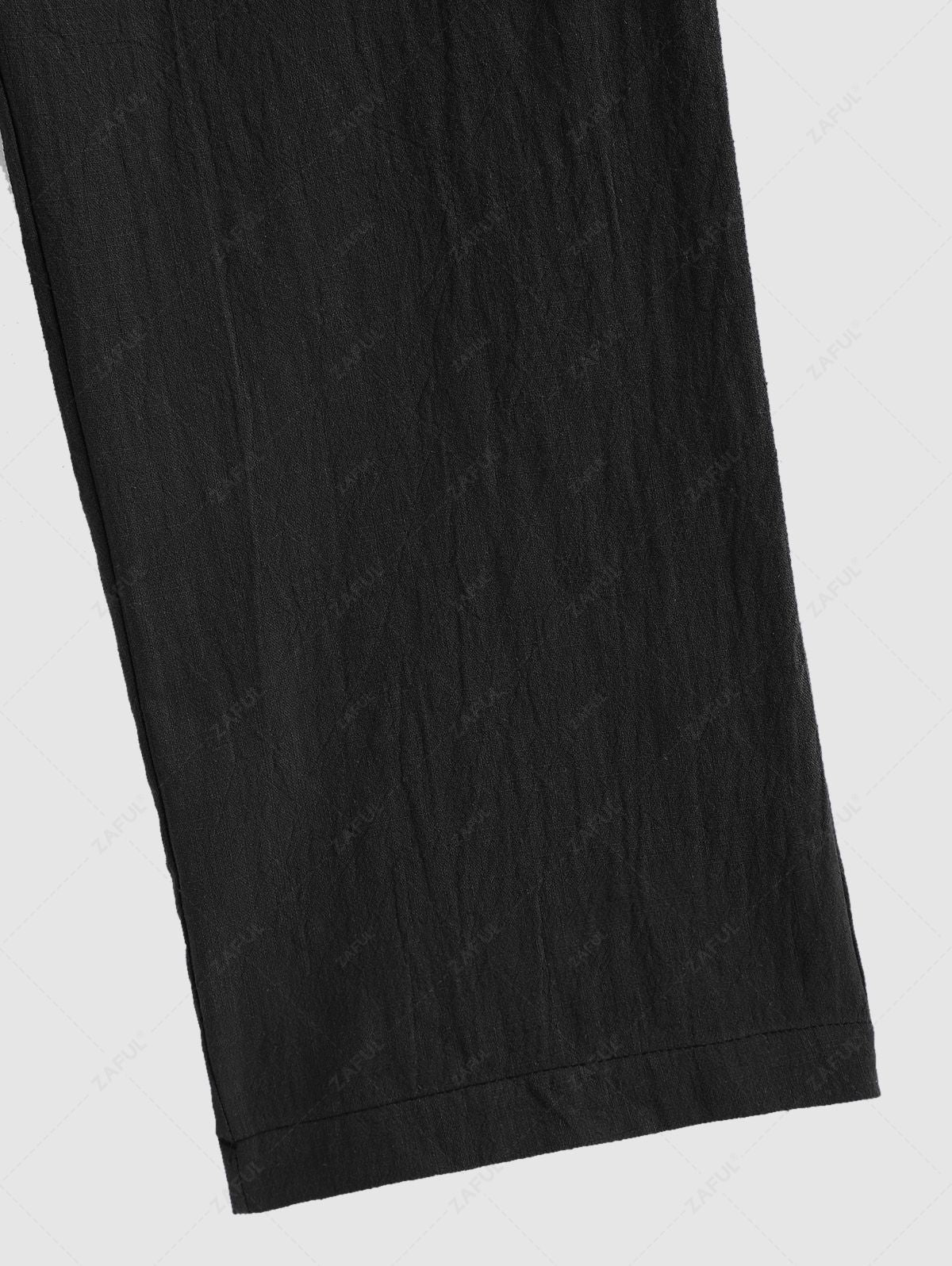 Pantalon droit en coton et lin de couleur unie avec fermeture à boutons pour homme