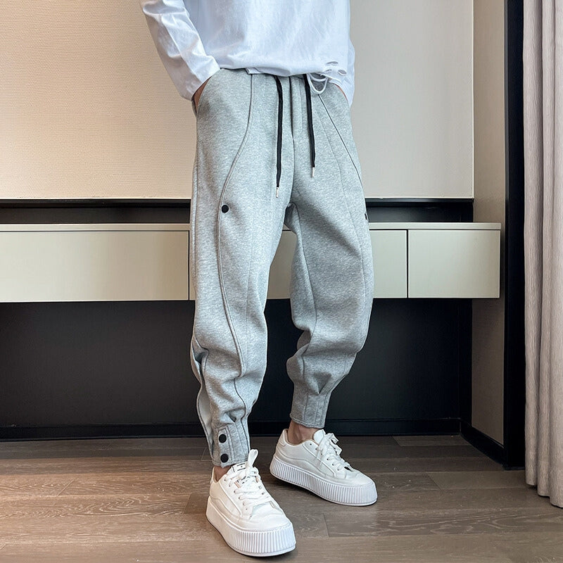 Pantalon de survêtement fuselé en velours de coton avec poche et boutons aux poignets