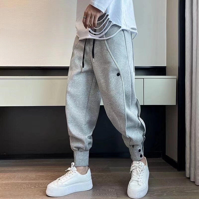 Pantalon de survêtement fuselé en velours de coton avec poche et boutons aux poignets