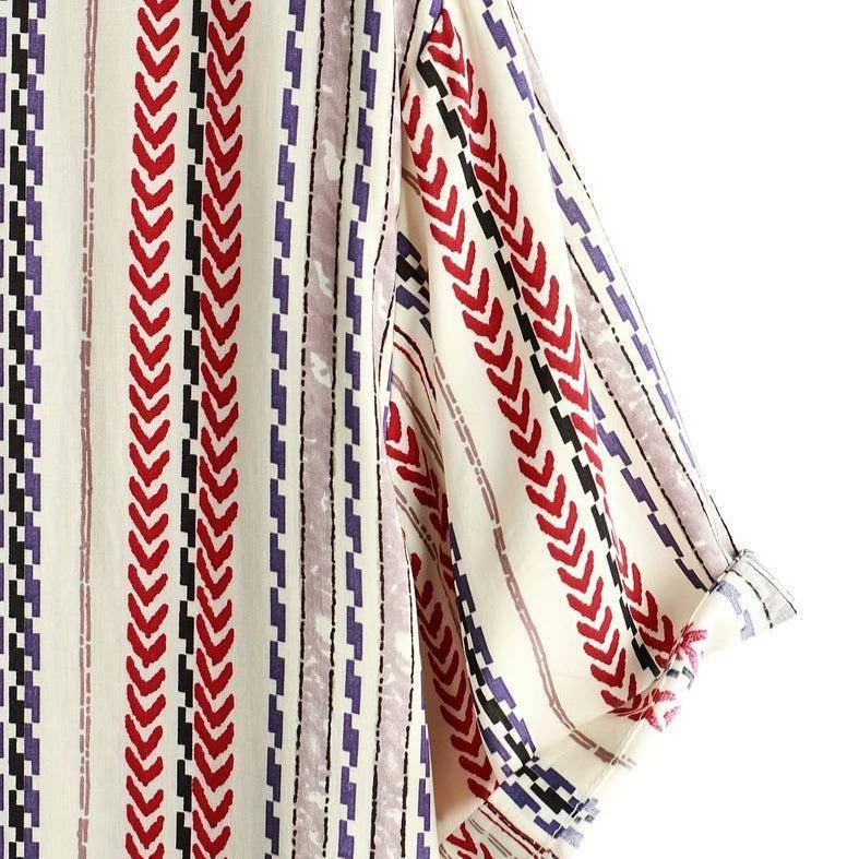 Chemise à rayures asymétriques pour femme – Audacieuse et moderne