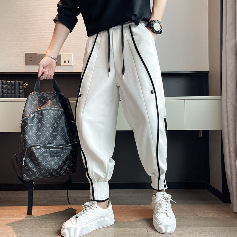 Pantalon de survêtement fuselé en velours de coton avec poche et boutons aux poignets