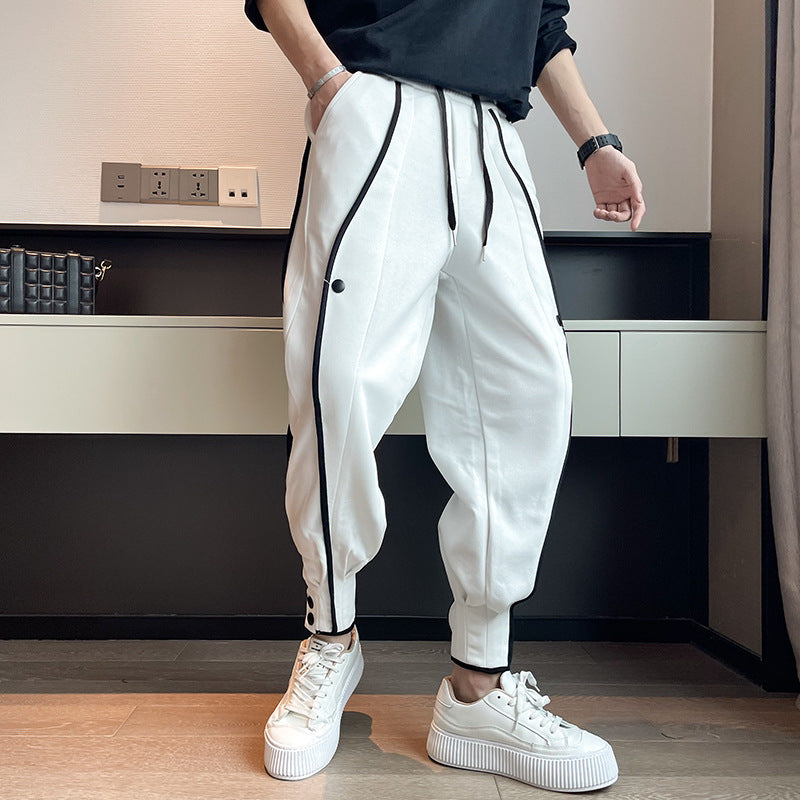 Pantalon de survêtement fuselé en velours de coton avec poche et boutons aux poignets