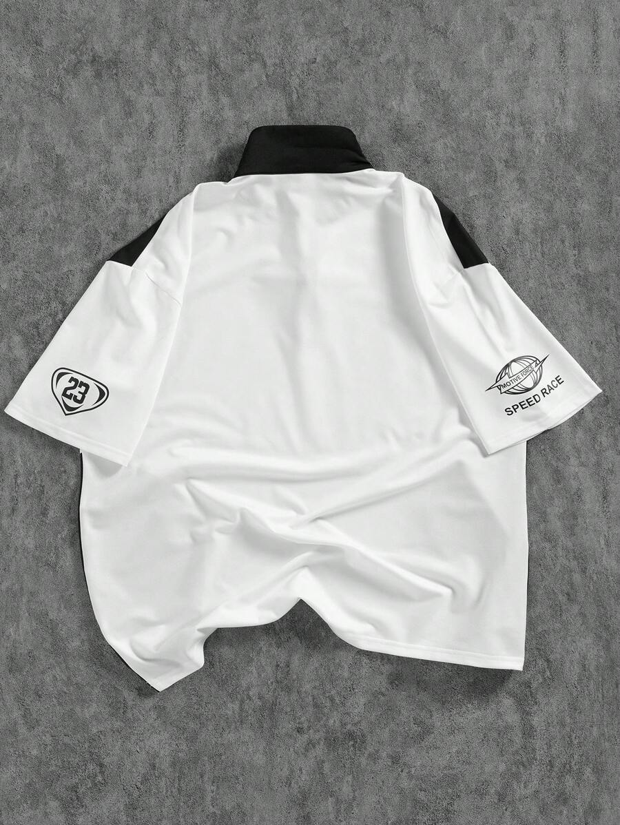 Polo uni avec patchwork, fermeture éclair sur le devant et motif graphique