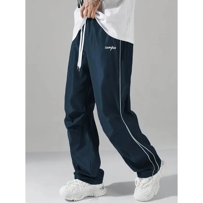 Pantalon droit décontracté de couleur unie avec cordon de serrage respirant