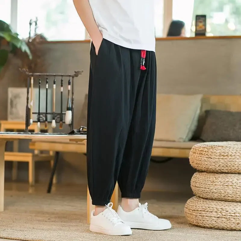 Pantalon de lin coupe ample avec bas cloche sarouel et taille décontractée