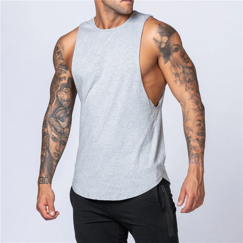 Chemises de sport en coton sans manches à emmanchures larges pour homme