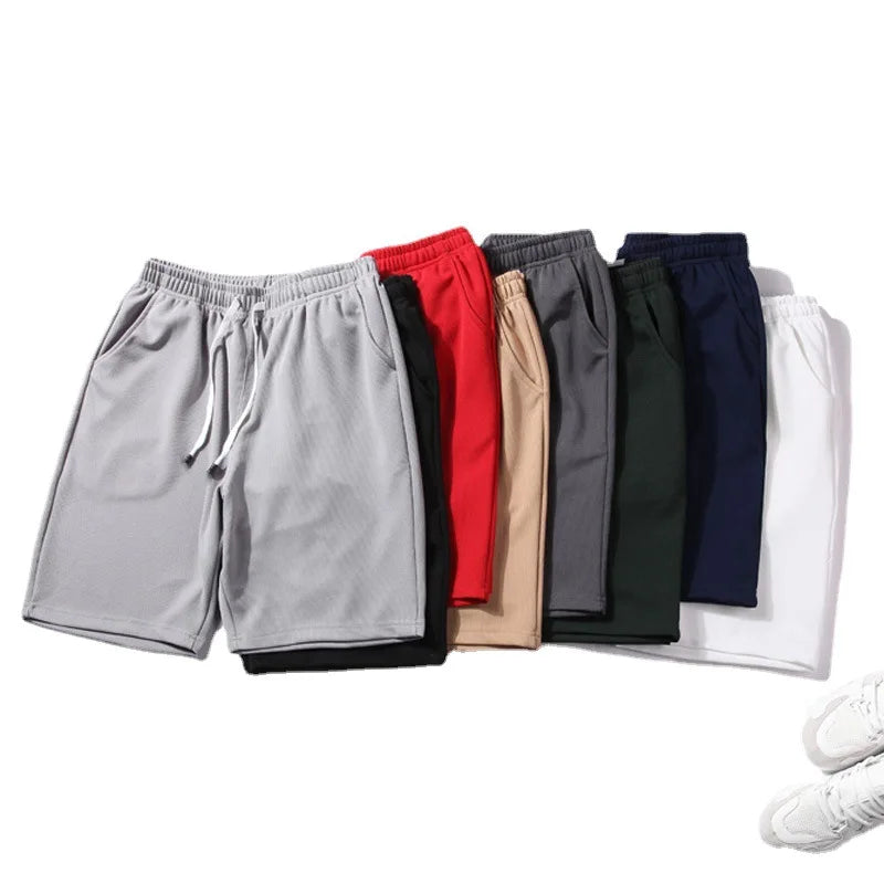 Short de sport à taille élastique et séchage rapide avec maille pour homme
