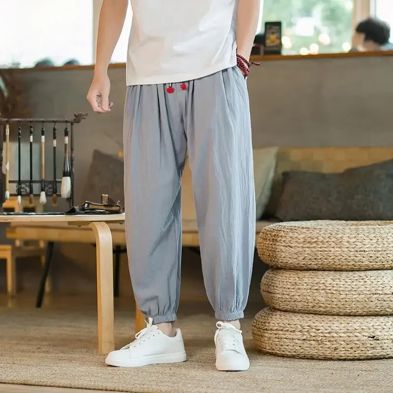 Pantalon de lin coupe ample avec bas cloche sarouel et taille décontractée