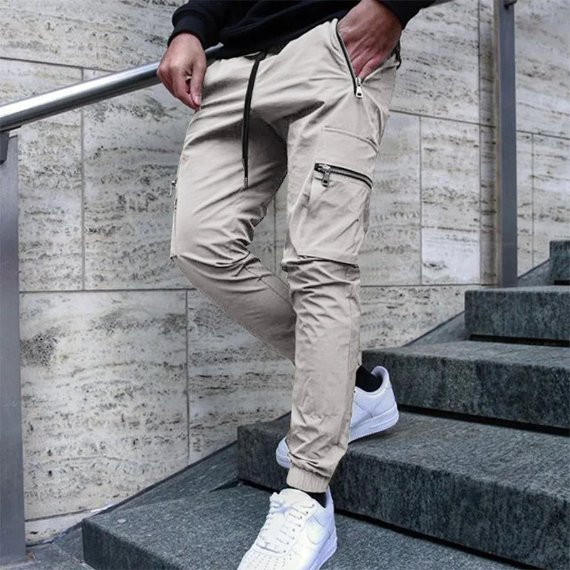 Pantalon cargo slim streetwear avec poches et poignets zippés