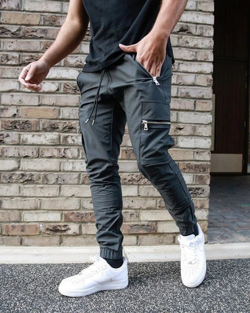 Pantalon cargo slim streetwear avec poches et poignets zippés