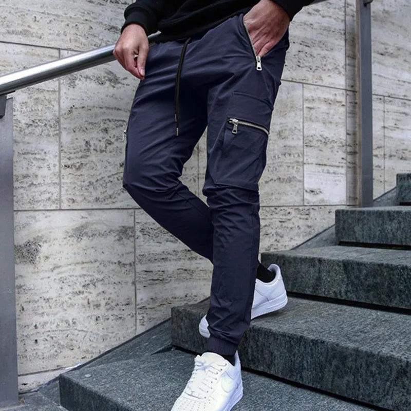 Pantalon cargo slim streetwear avec poches et poignets zippés