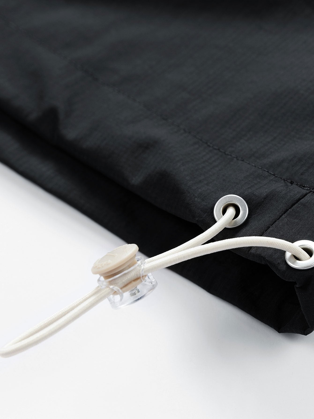 Coupe-vent à capuche léger en nylon avec fermeture éclair quart de tour pour homme