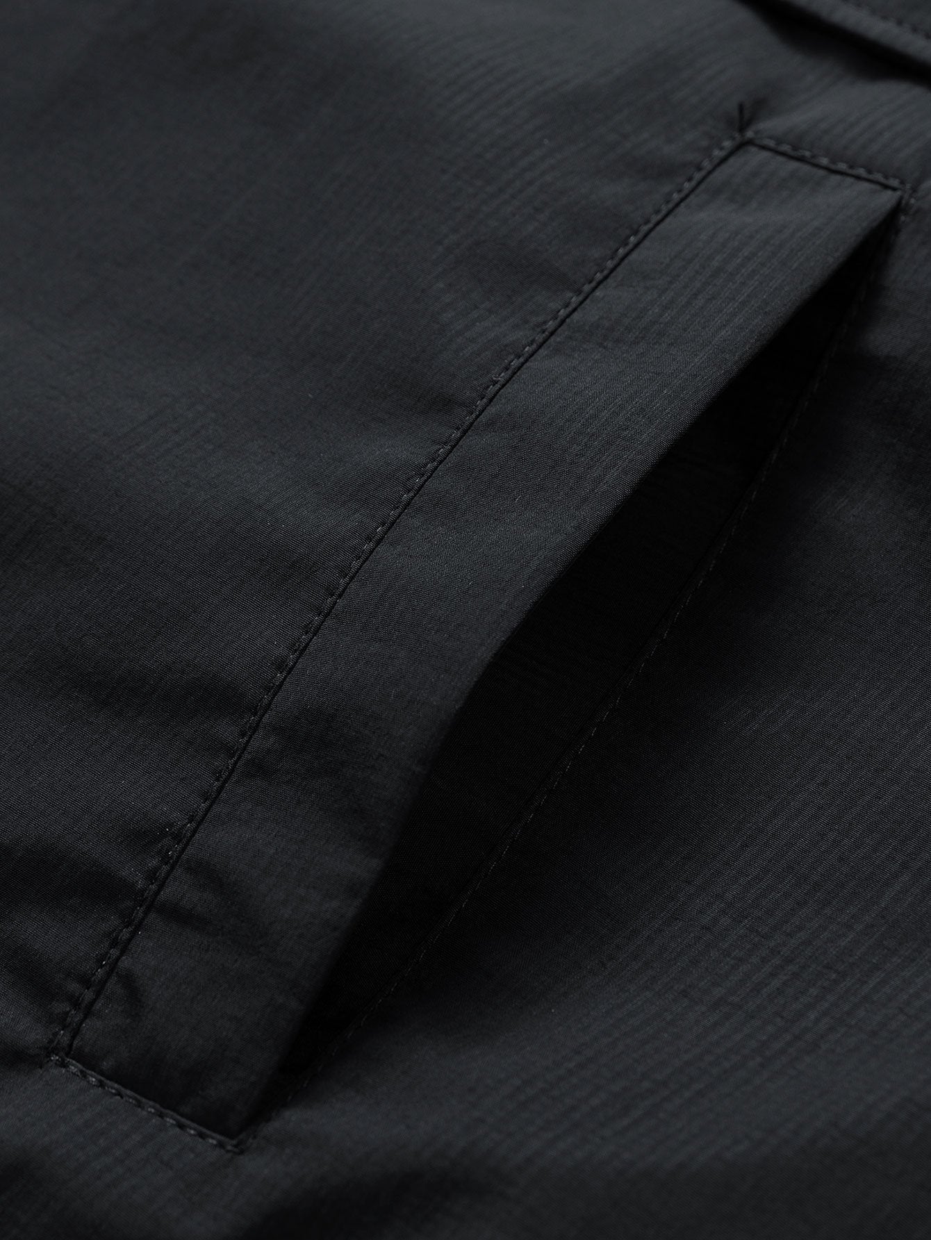 Coupe-vent à capuche léger en nylon avec fermeture éclair quart de tour pour homme