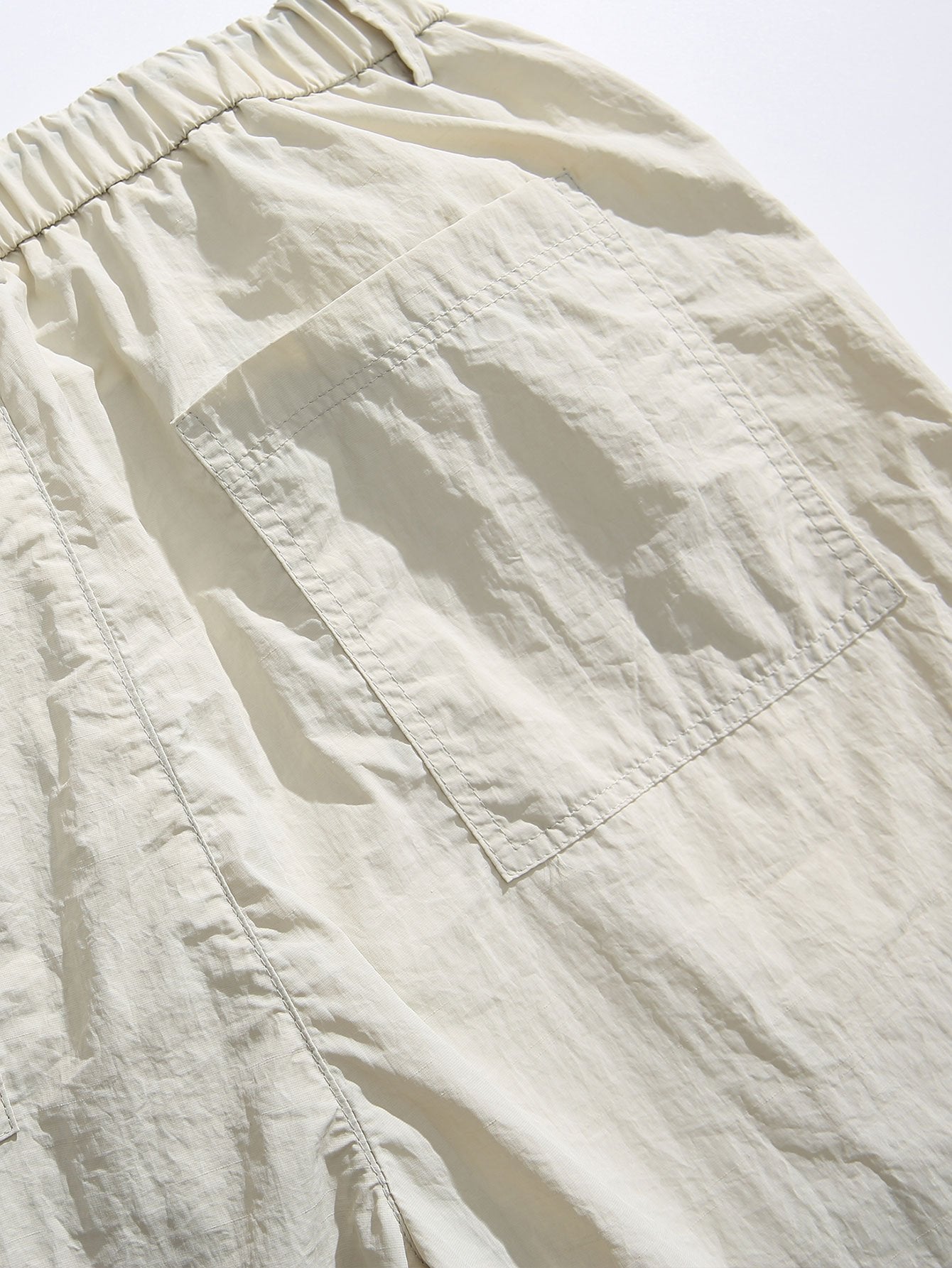 Pantalon droit parachute à taille élastique avec cordon de serrage pour homme