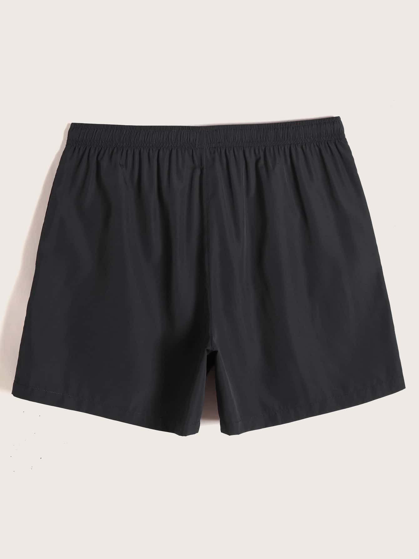 Short court décontracté de style plage avec cordon de serrage pour homme