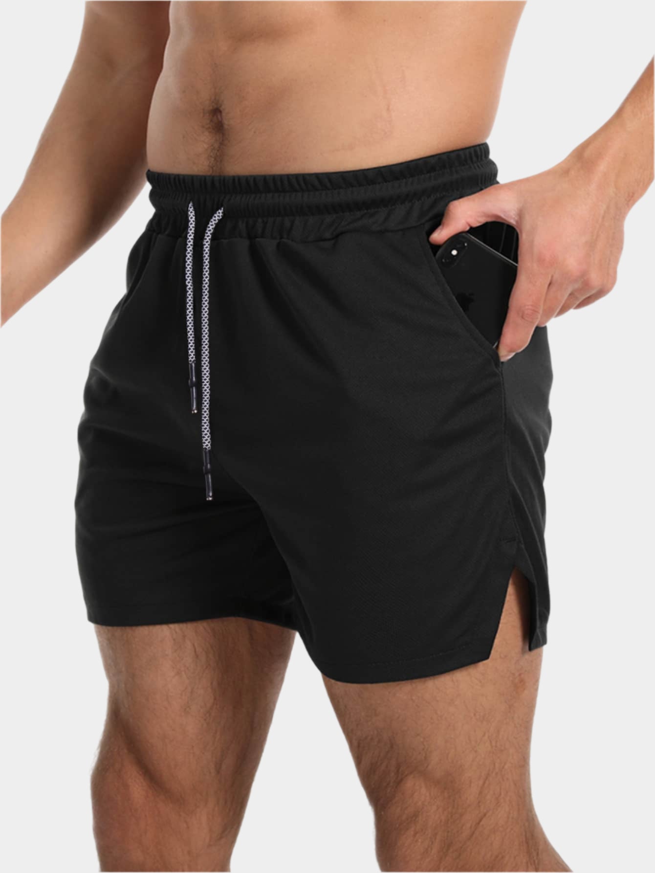 Shorts de sport avec fente, taille élastique et poche pour téléphone pour hommes