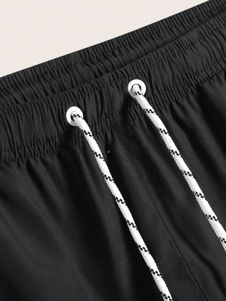 Short court décontracté de style plage avec cordon de serrage pour homme