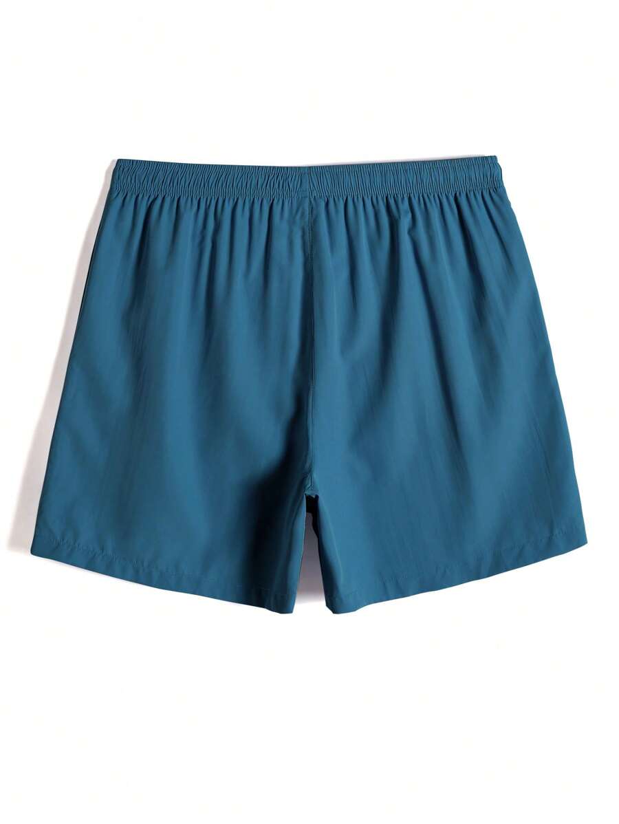 Short court décontracté de style plage avec cordon de serrage pour homme